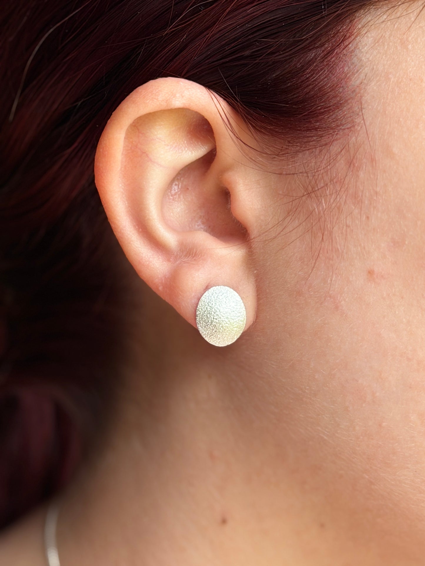 Oval frosted curved silver studs