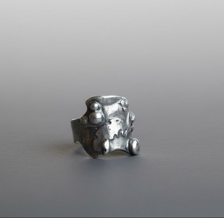 Alchemy Silver Thick molten band with beads and raised sections