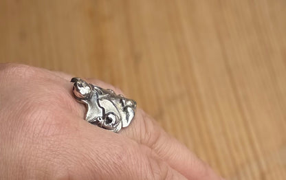 Alchemy Silver Thick molten band with beads and raised sections side view on hand