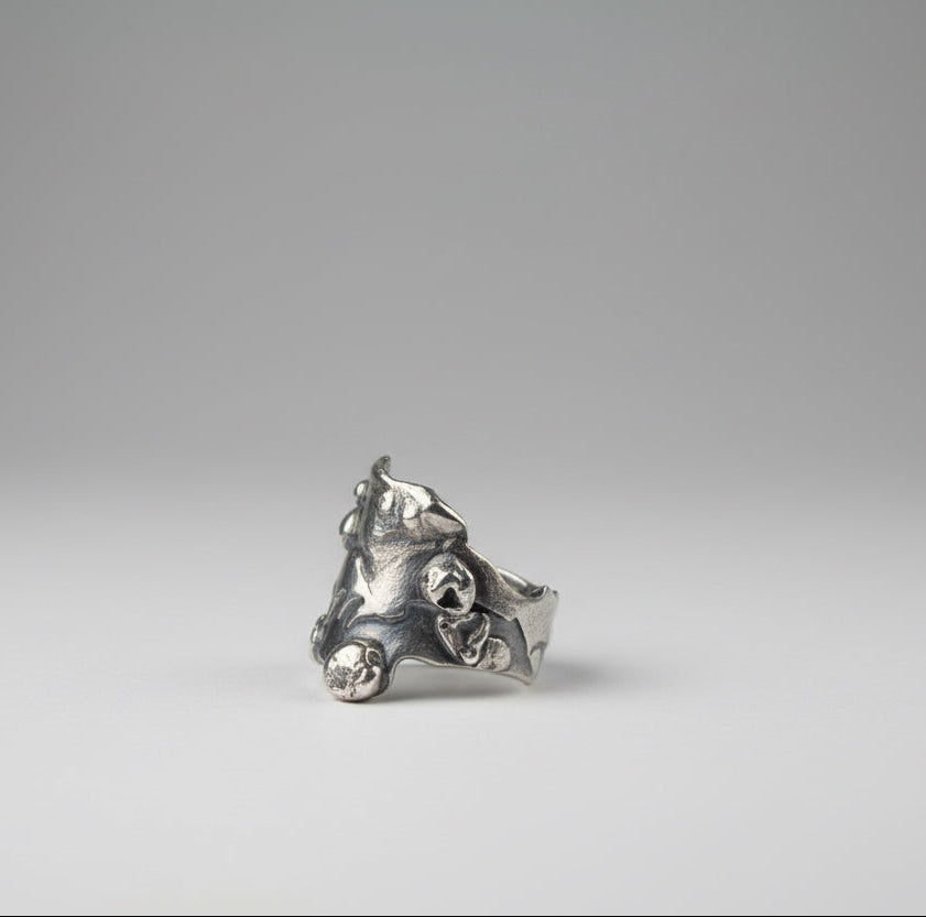 Alchemy Silver Thick molten band with beads and raised sections