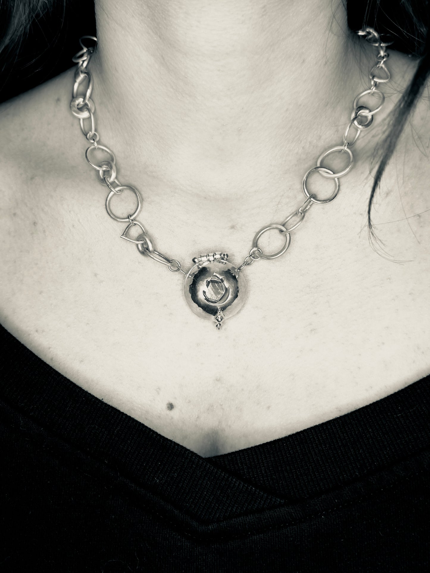 ‘The Fire Within’ necklace with flame cut out. Sun stone set