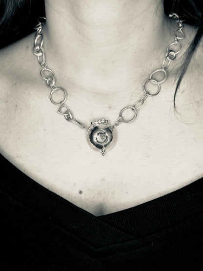 ‘The Fire Within’ necklace with flame cut out. Sun stone set