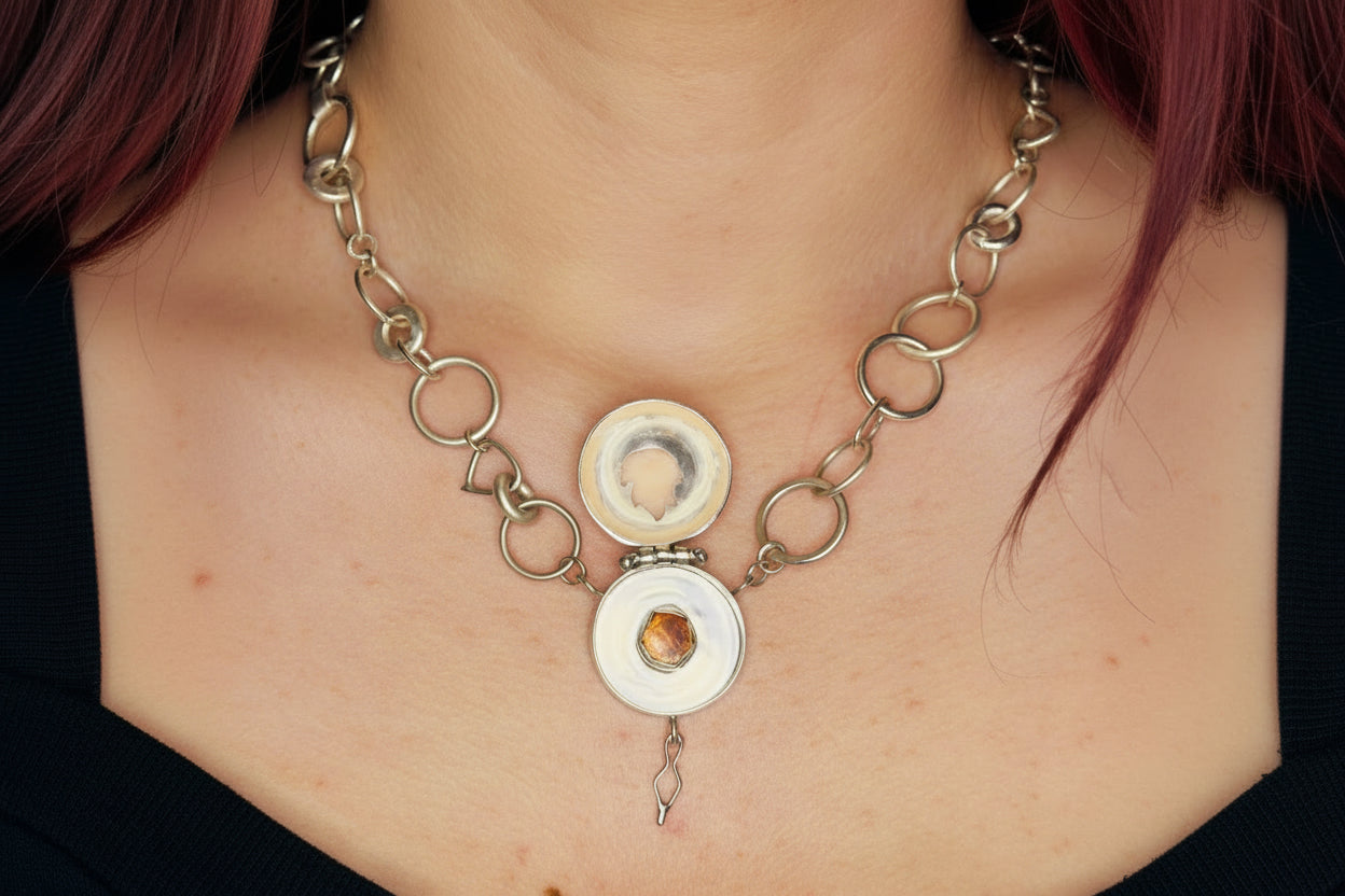 ‘The Fire Within’ necklace with flame cut out. Sun stone set