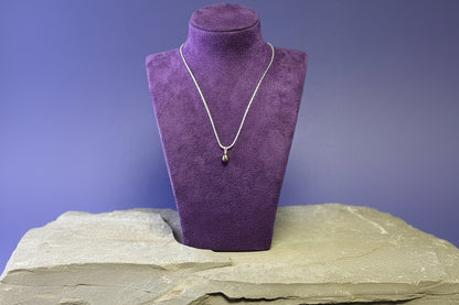 Dark pearl drop pendant on chain
