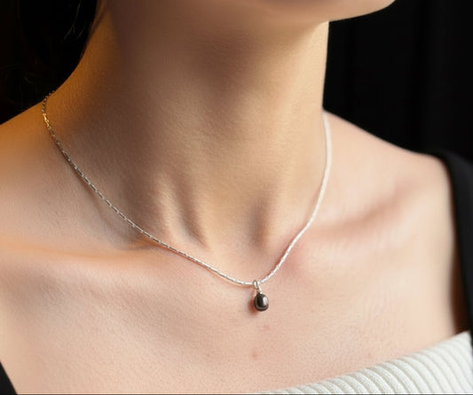 Black pearl drop on silver fancy necklace 