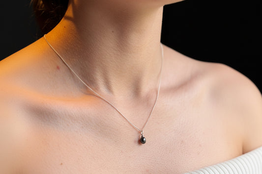 Dark pearl drop on fine curb chain