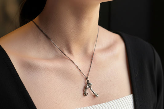 Silver Molten alchemy necklace with rhodolite garnet on model