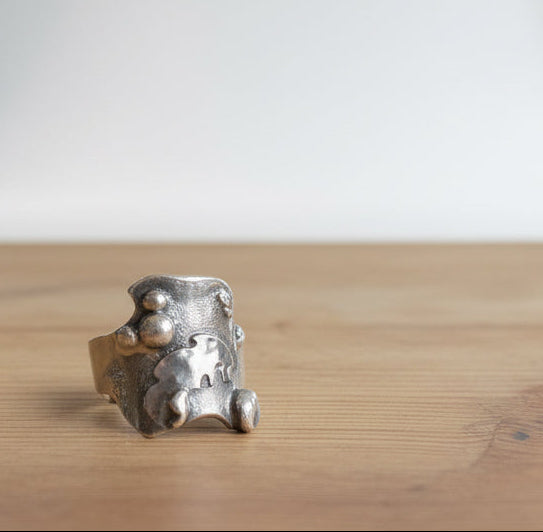 Alchemy Silver Thick molten band with beads and raised sections