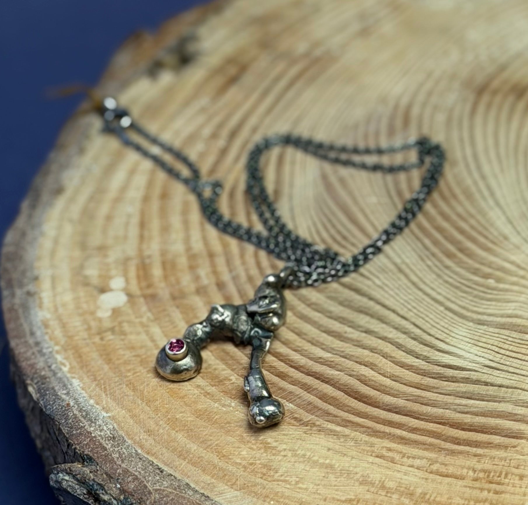 Oxidised silver necklace with rodolite garnet set