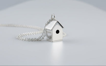 Birdhouse pendant with base
