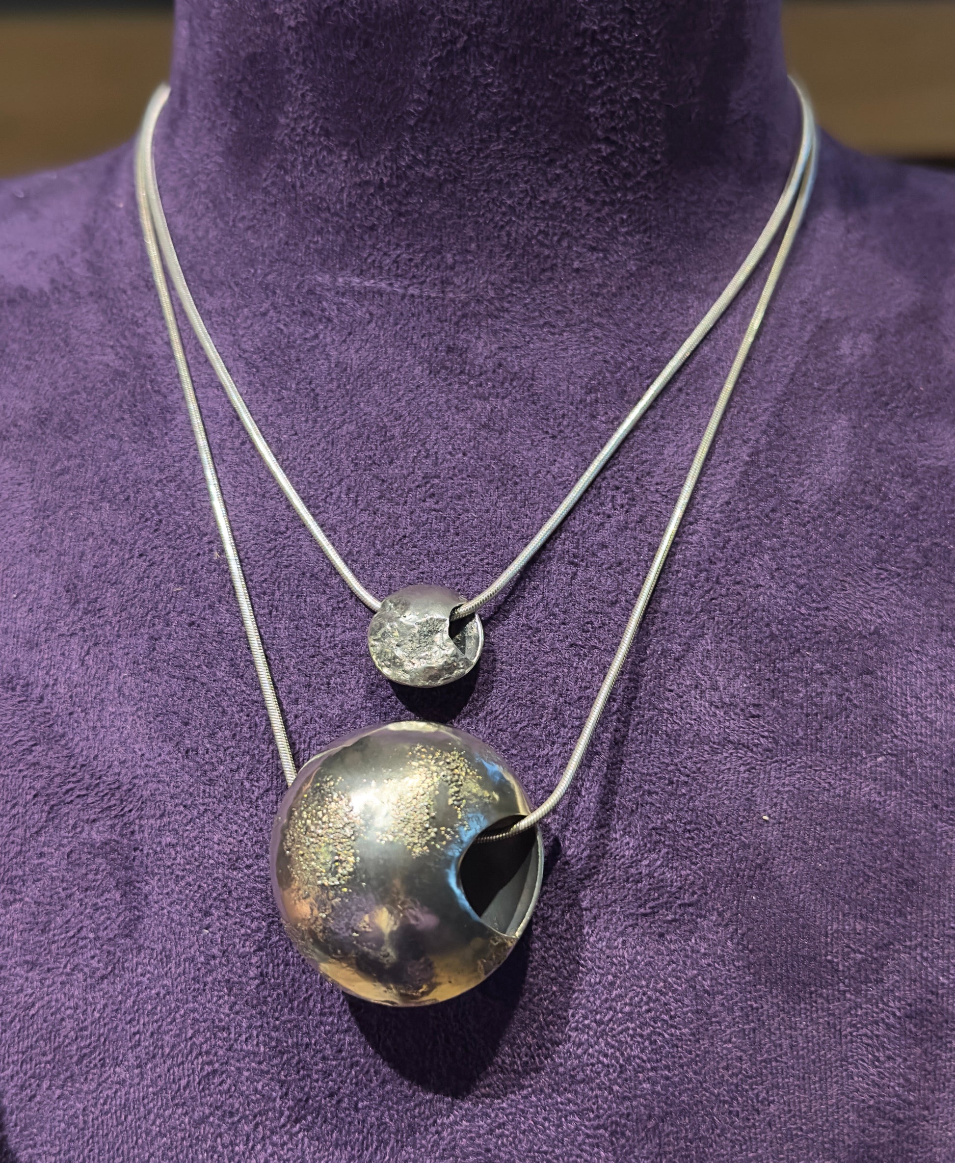 Moon pendant on chain in silver