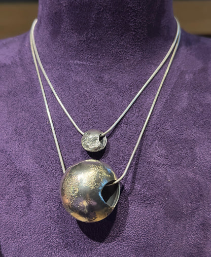 Moon pendant on chain in silver