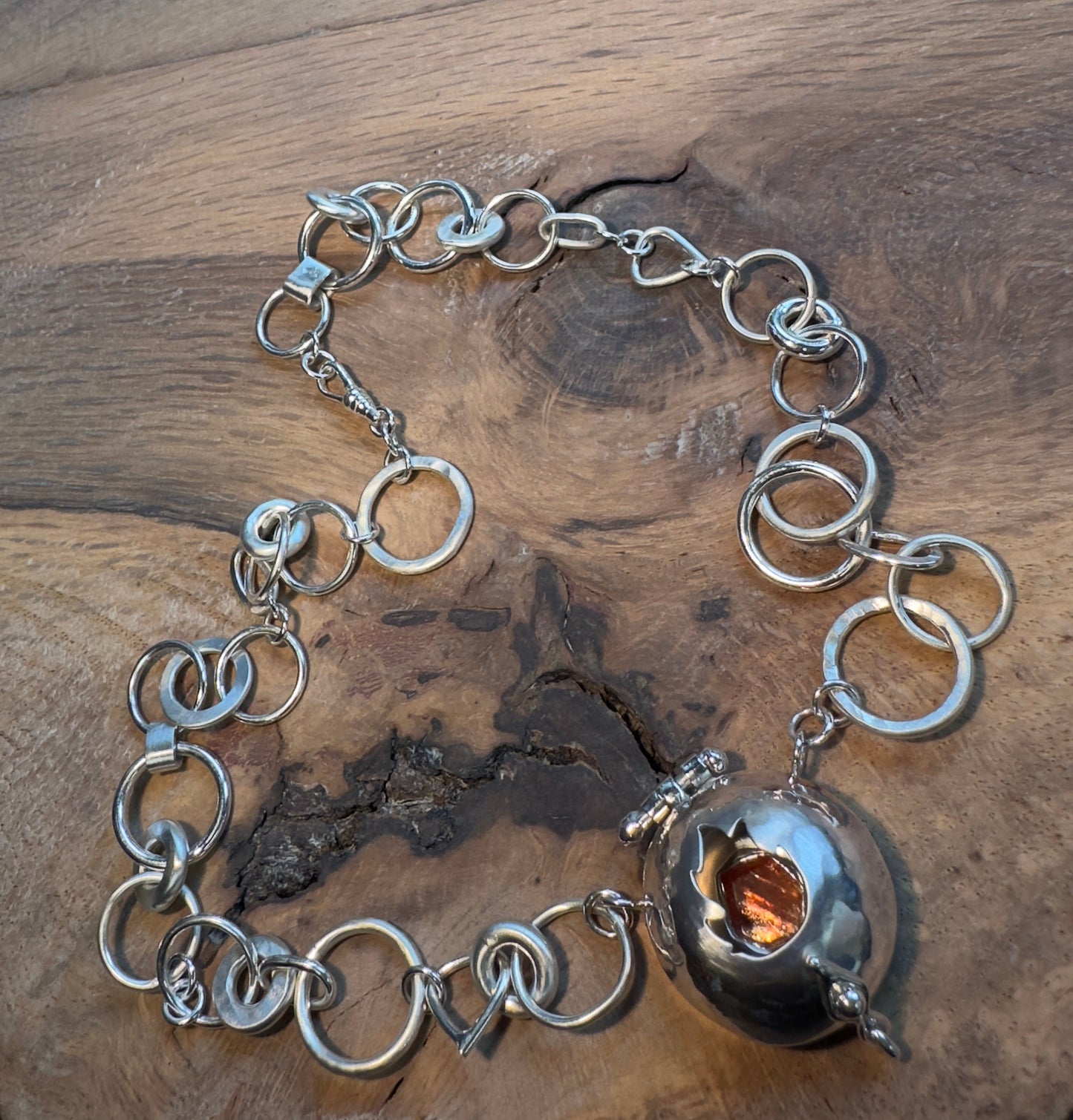 ‘The Fire Within’ necklace with flame cut out. Sun stone set