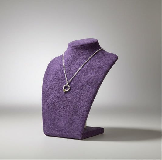 Small beaded circle pendant with small hammered 9ct yellow gold hammered disc