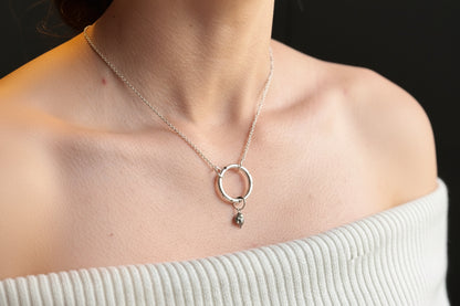Silver molten drop ring necklace with carved recesses on the ring