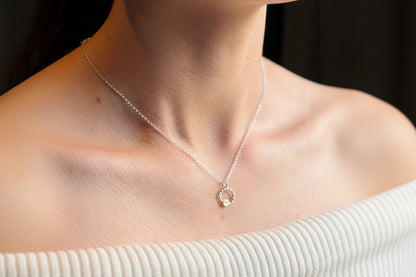 Beaded circle pendant with small textured 9ct yellow gold disc