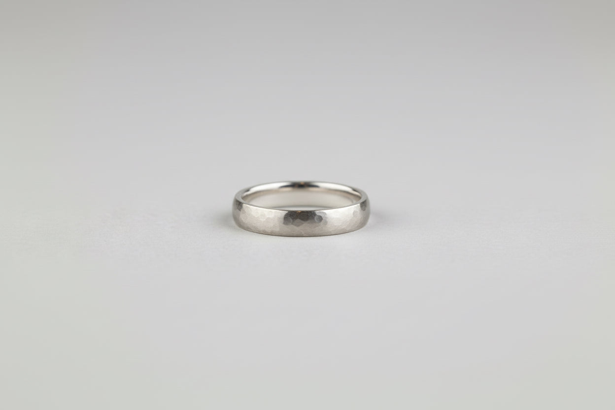 Silver court shaped band, hammered and satin finished
