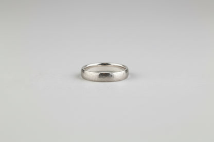 Silver court shaped band, hammered and satin finished

