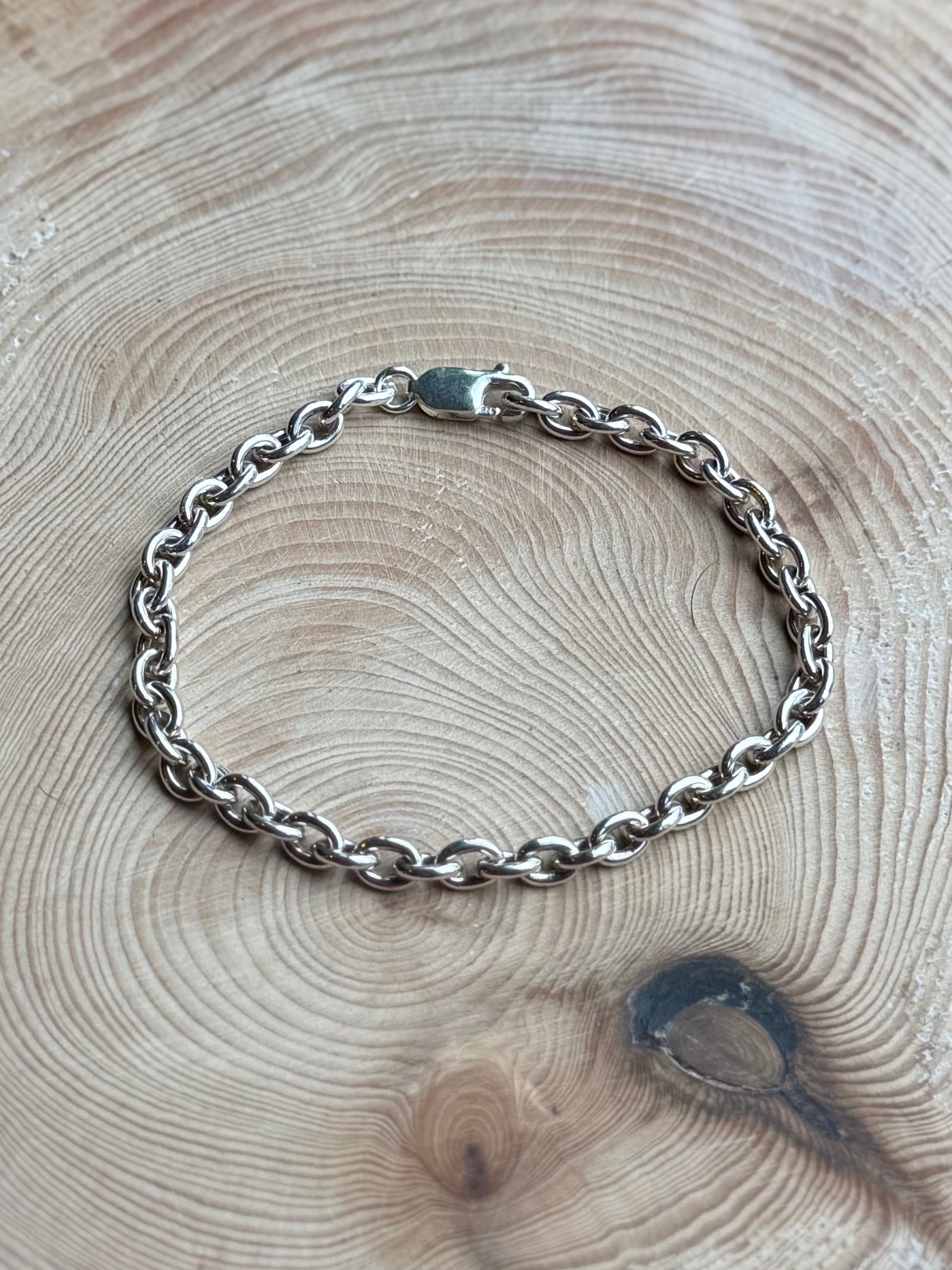 8” silver belcher bracelet on wood