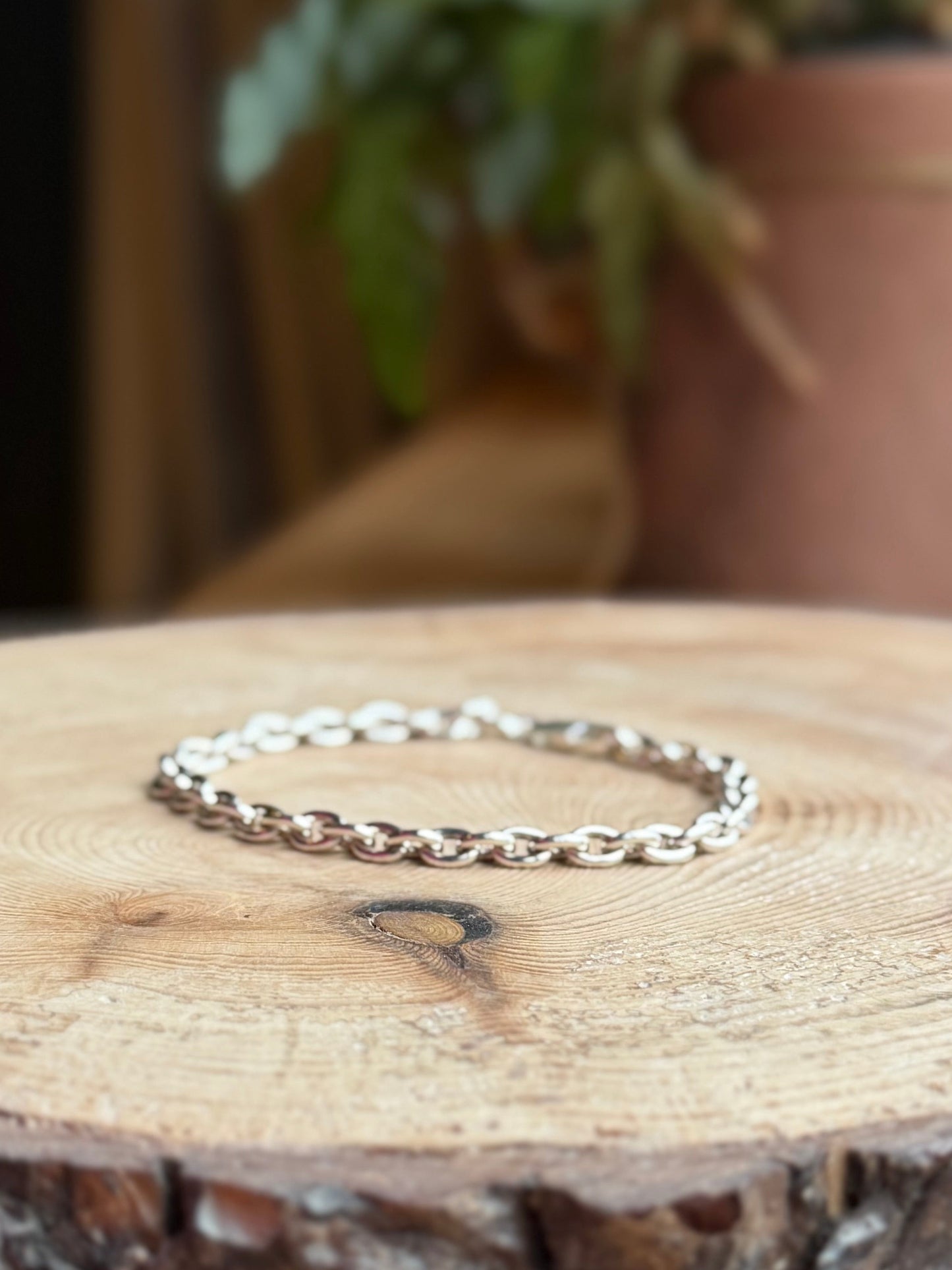 8” silver belcher chain bracelet on wood