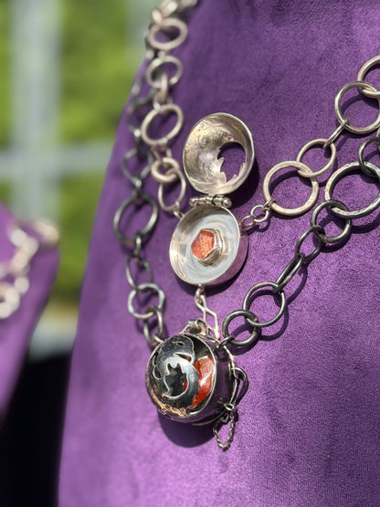 ‘The Fire Within’ necklace with flame cut out. Sun stone set