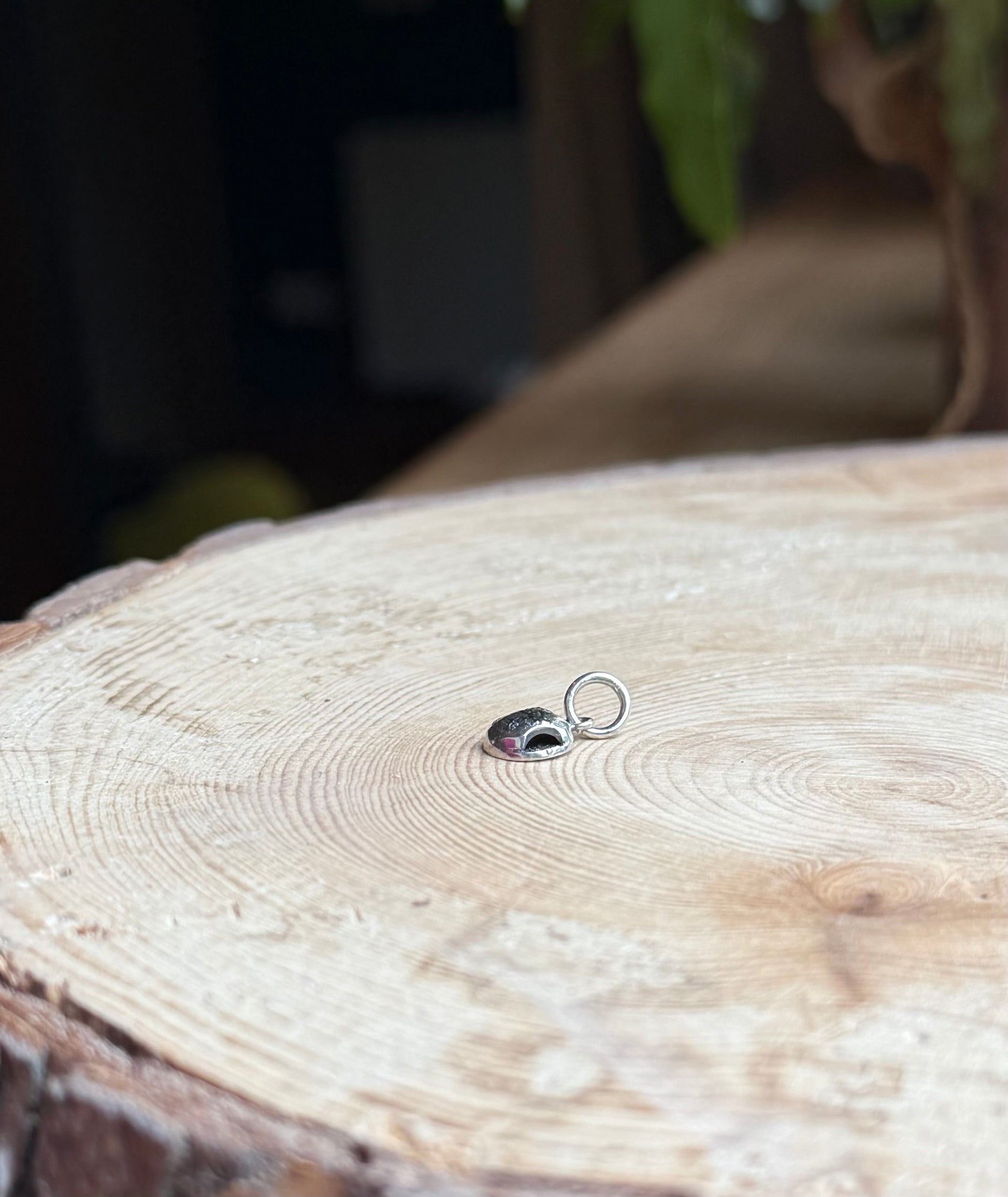 TTMAB charm on wood