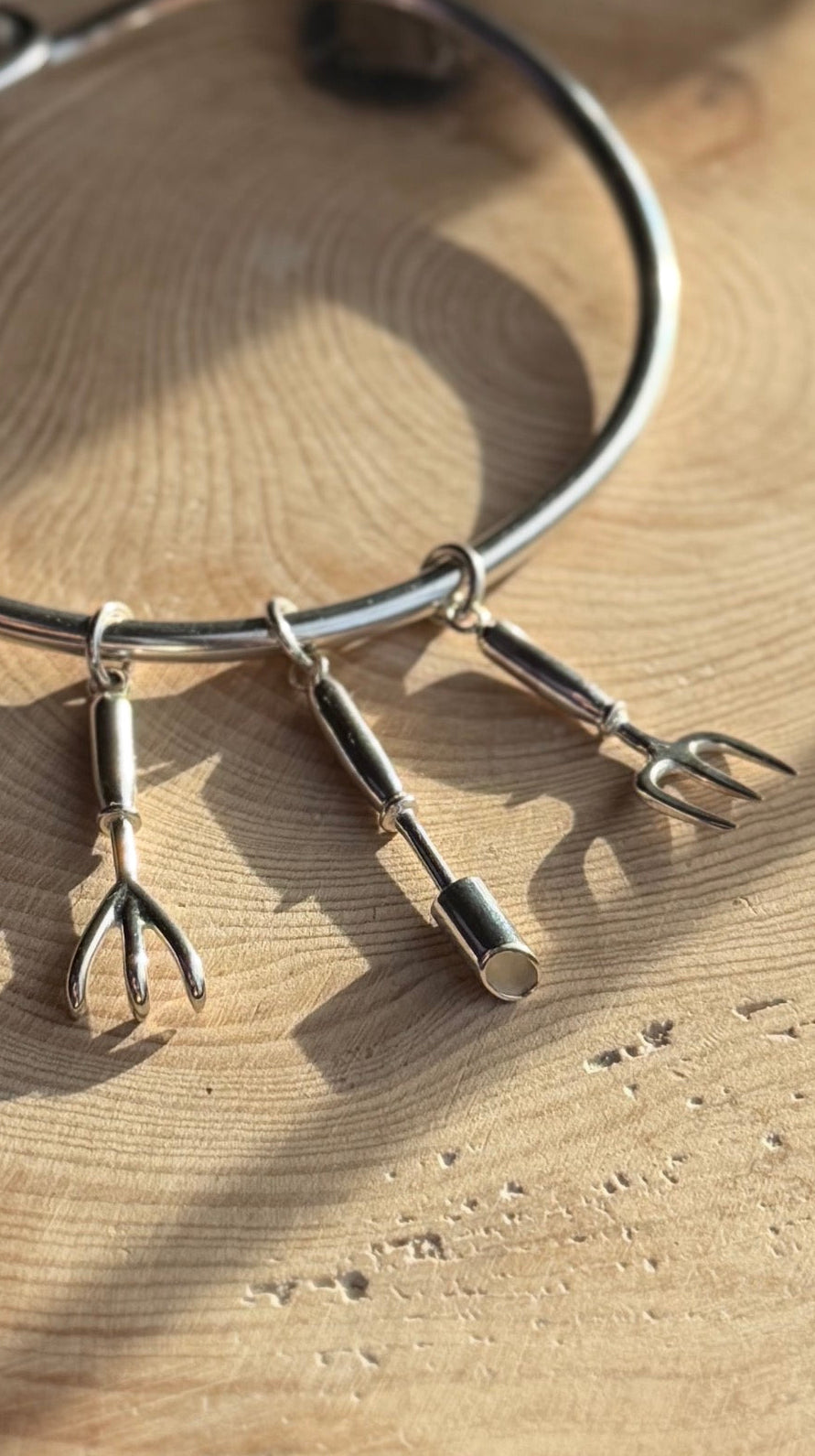 Garden charms on a bangle