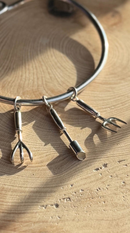 Garden charms on a bangle