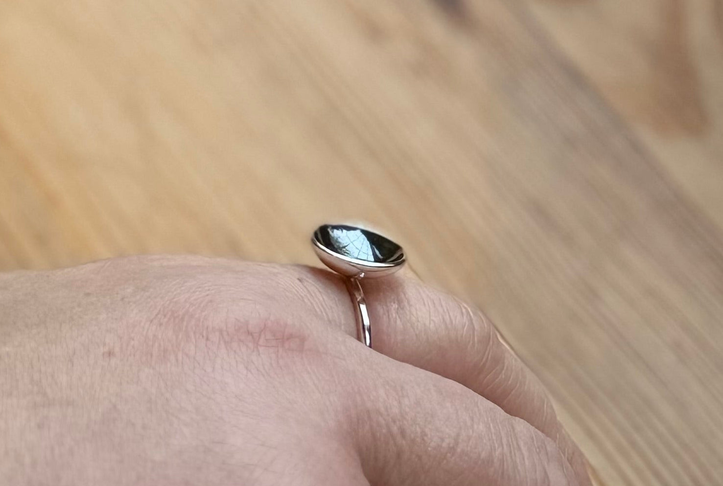 Silver ring with domed oxidised disc