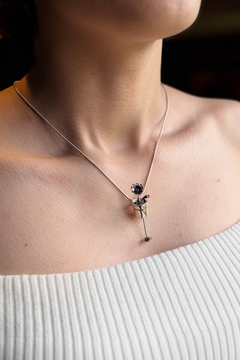 Silver flower pot necklace

