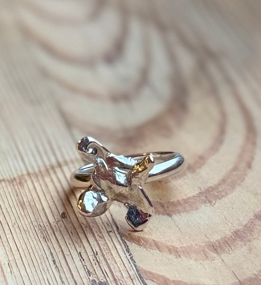 Molten Alchemy ring, handmade in silver on wood