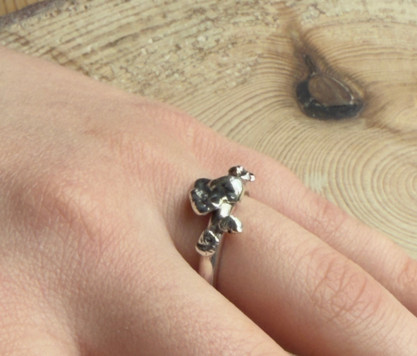Alchemy ring 4 molten nuggets in silver on hand