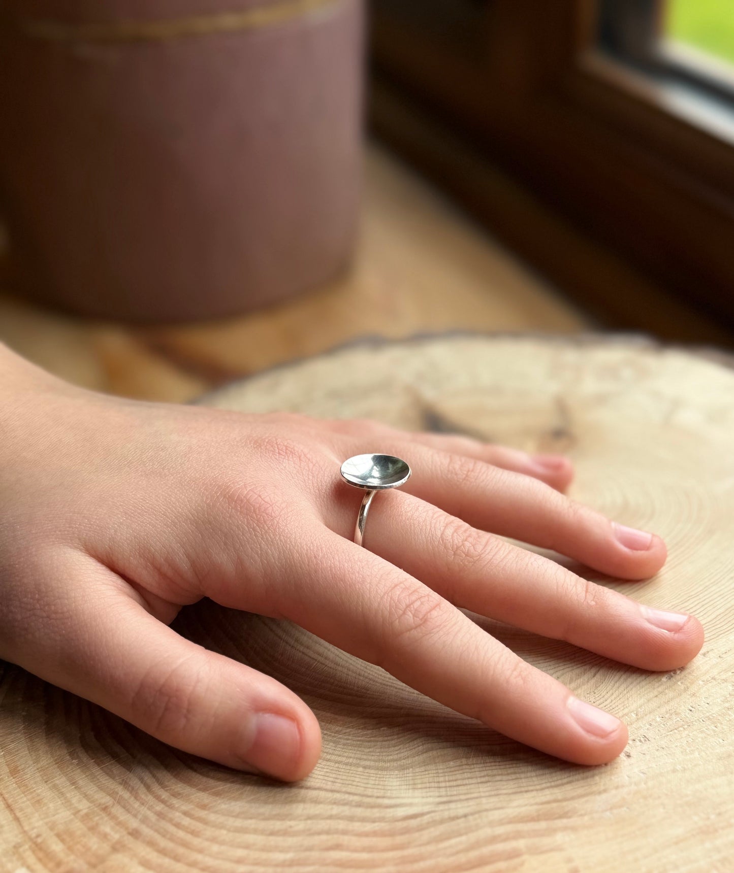 Silver ring band with polished dome