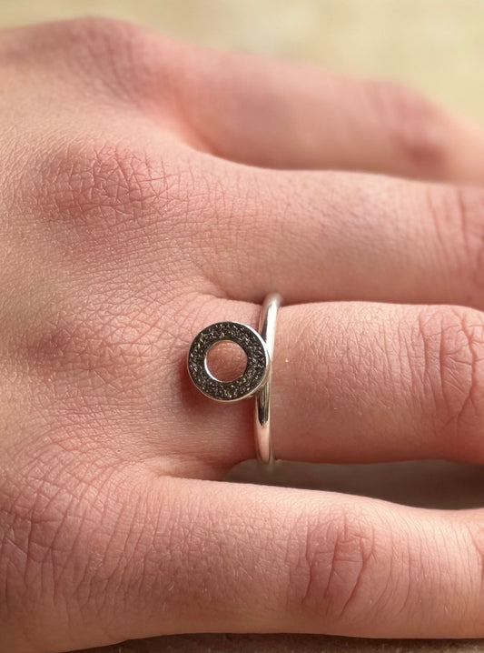 Stacking ring with donut on hand
