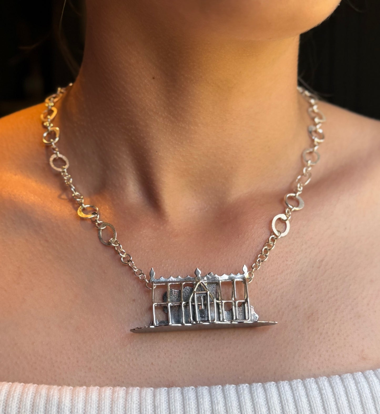 Victorian greenhouse necklace being worn by model